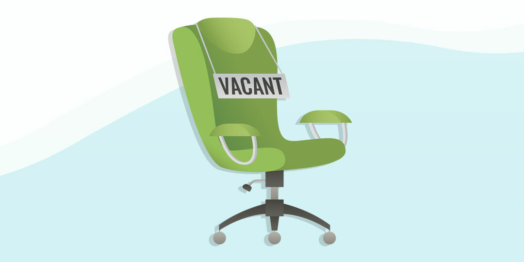 office chair with a vacant sign